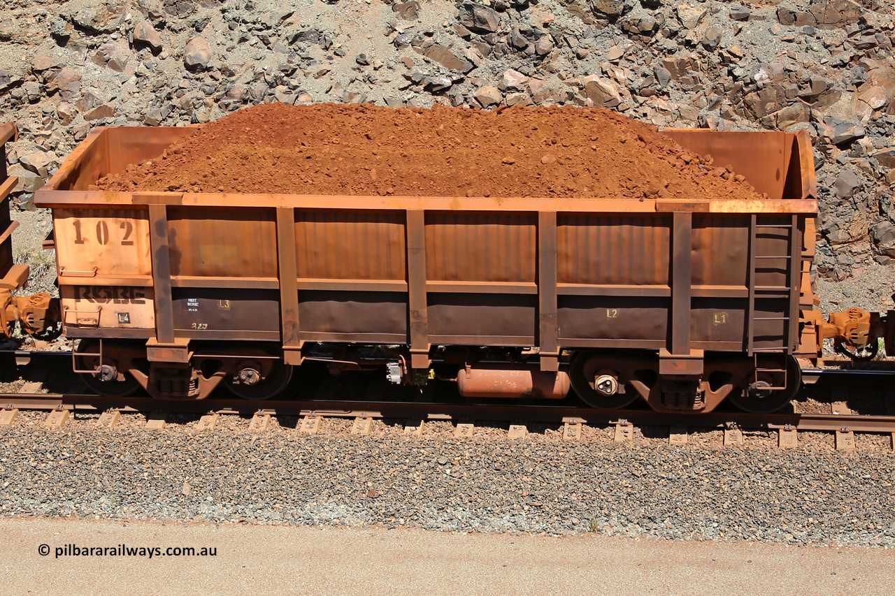 0102 160306 1534
Robe River ore waggon 102, side looks to have been repaired by Centurion Industries WA, note waybill holder and no plate indication, fixed coupler non-handbrake side loaded view at the 45 km, Harding Siding on the Cape Lambert line. March 6, 2016.
Keywords: 102;Nippon-Sharyo-Nihon;Robe-ore-waggon;