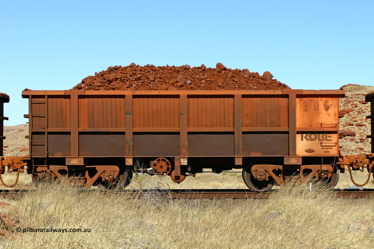 0106 060722 7505
Robe River ore waggon 106, built by Nippon Sharyo Nihon, handbrake side loaded view at the 78.8 km between Western Creek and Maitland on the Deepdale line. July 22, 2006.
Keywords: 106;Nippon-Sharyo-Nihon;Robe-ore-waggon;