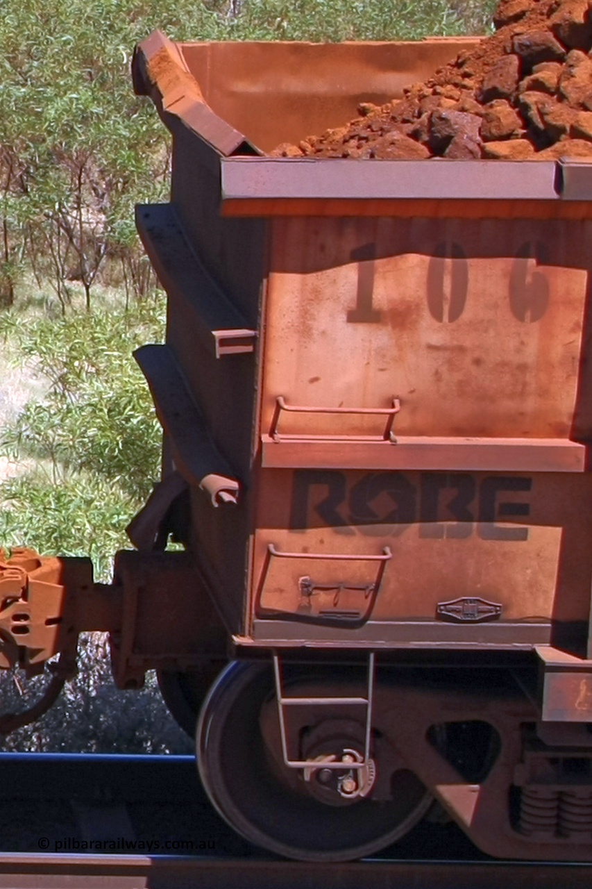 0106 081209 0127
Robe River ore waggon 106, built by Nippon Sharyo Nihon, rotary coupler end and plate detail loaded view at the 7 km location just south of Cape Lambert yard. December 9, 2008.
Keywords: 106;Nippon-Sharyo-Nihon;Robe-ore-waggon;