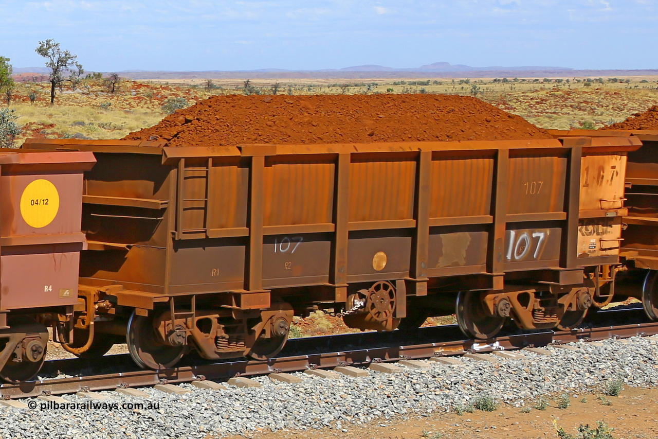 0107 170729 0222
Robe River ore waggon 107, built by Nippon Sharyo Nihon, fixed coupler handbrake side loaded view at the 103 km, between Maitland Siding and the Fortescue River on the Deepdale line. July 29, 2017.
Keywords: 107;Nippon-Sharyo-Nihon;Robe-ore-waggon;