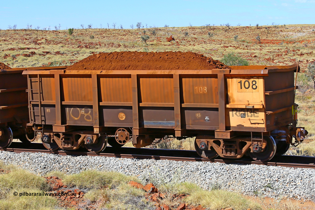 0108 170729 0279
Robe River ore waggon 108, built by Nippon Sharyo Nihon, rotary coupler end handbrake side loaded view, end of train, at the 103 km, between Maitland Siding and the Fortescue River on the Deepdale line. July 29, 2017.
Keywords: 108;Nippon-Sharyo-Nihon;Robe-ore-waggon;