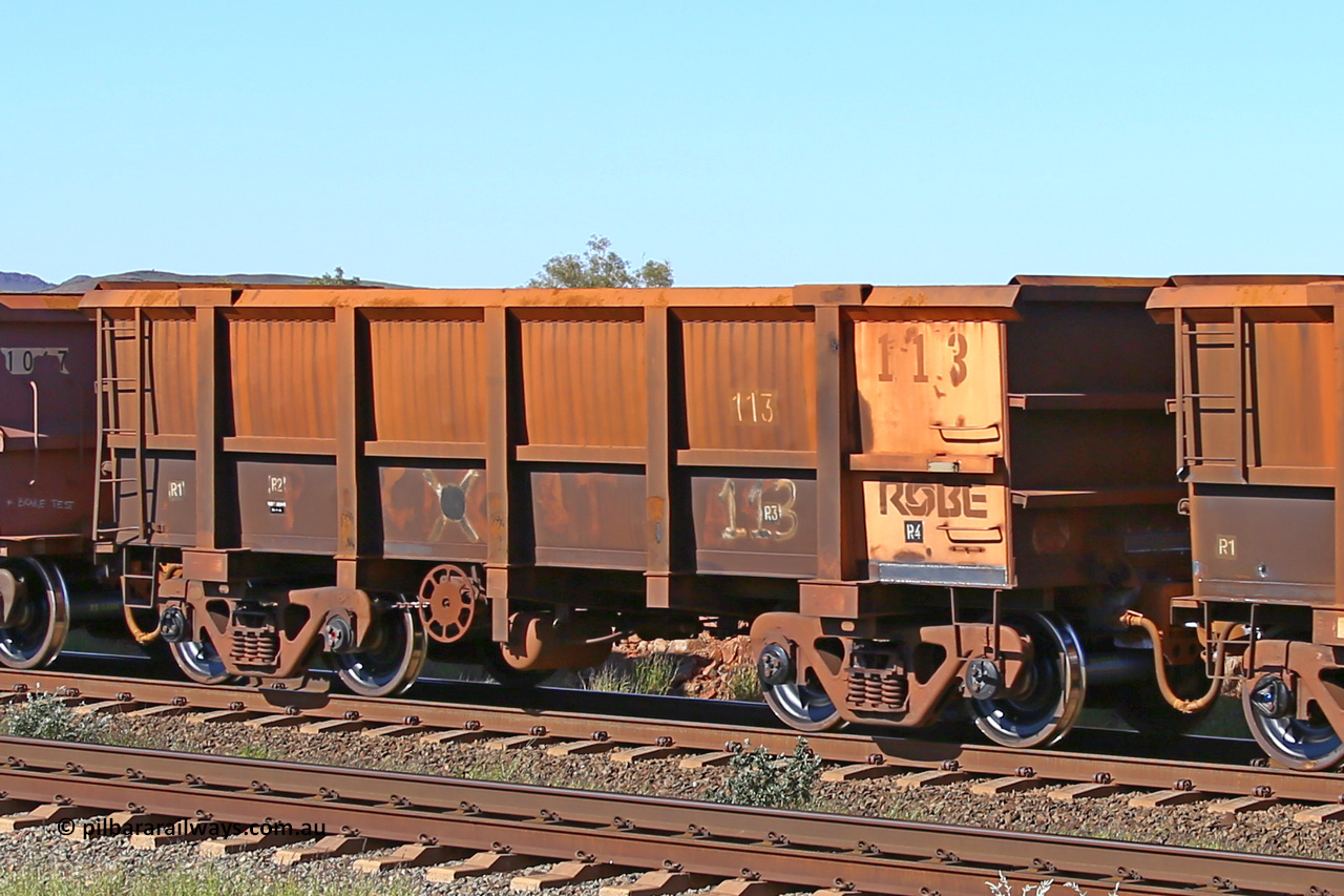 0113 160727 0990
Robe River ore waggon 113, built by Nippon Sharyo Nihon, rotary coupler end handbrake side empty view at Harding Siding on the Cape Lambert line, July 27, 2016.
Keywords: 113;Nippon-Sharyo-Nihon;Robe-ore-waggon;