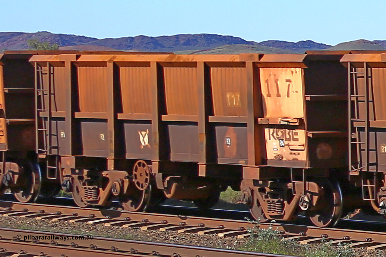 0117 160727 0969
Robe River ore waggon 117, built by Nippon Sharyo Nihon, rotary coupler end handbrake side empty view at Harding Siding on the Cape Lambert line, July 27, 2016.
Keywords: 117;Nippon-Sharyo-Nihon;Robe-ore-waggon;
