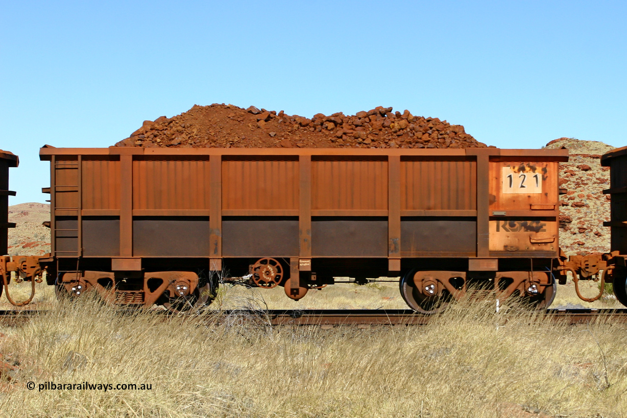 0121 060722 7496
Robe River ore waggon 121, built by Nippon Sharyo Nihon, handbrake side loaded view at the 78.8 km between Western Creek and Maitland on the Deepdale line. July 22, 2006.
Keywords: 121;Nippon-Sharyo-Nihon;Robe-ore-waggon;
