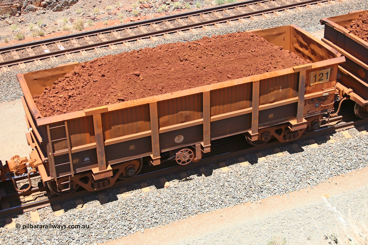 0121 160306 1455
Robe River ore waggon 121, built by Nippon Sharyo Nihon, fixed coupler handbrake side loaded view at the 45 km, Harding Siding on the Cape Lambert line. March 6, 2016.
Keywords: 121;Nippon-Sharyo-Nihon;Robe-ore-waggon;