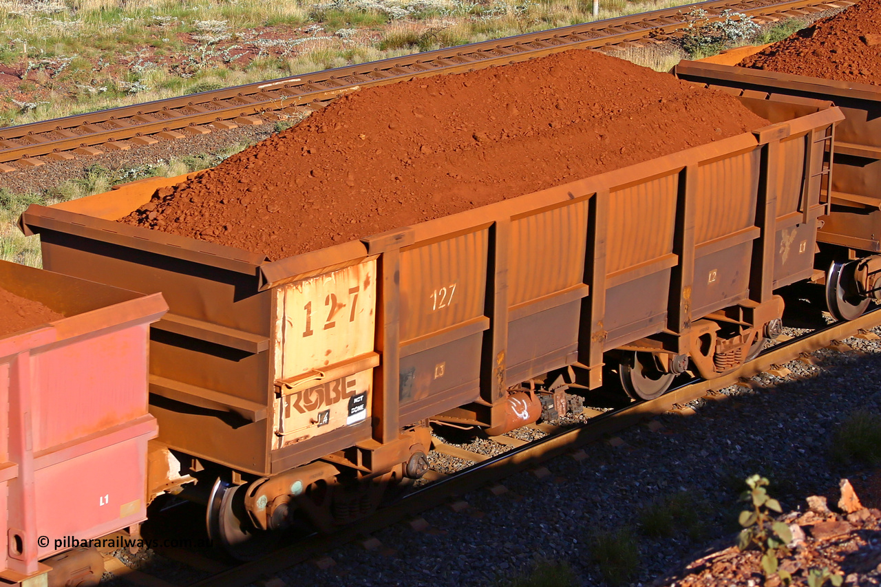 0127 210322 9686
Robe River ore waggon 127, built by Nippon Sharyo Nihon, rotary coupler end non-handbrake side loaded view at the 17 km on the Cape Lambert line, March 22, 2021.
Keywords: 127;Nippon-Sharyo-Nihon;Robe-ore-waggon;