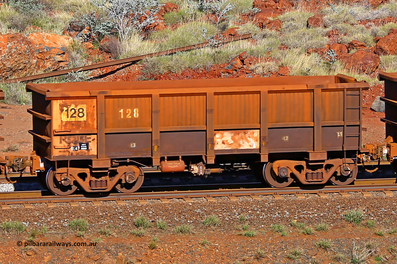 0128 180616 1701
Robe River ore waggon 128, built by Nippon Sharyo Nihon, rotary coupler end non-handbrake side empty view at the 38 km, Harding on the Cape Lambert line, June 16, 2018.
Keywords: 128;Nippon-Sharyo-Nihon;Robe-ore-waggon;