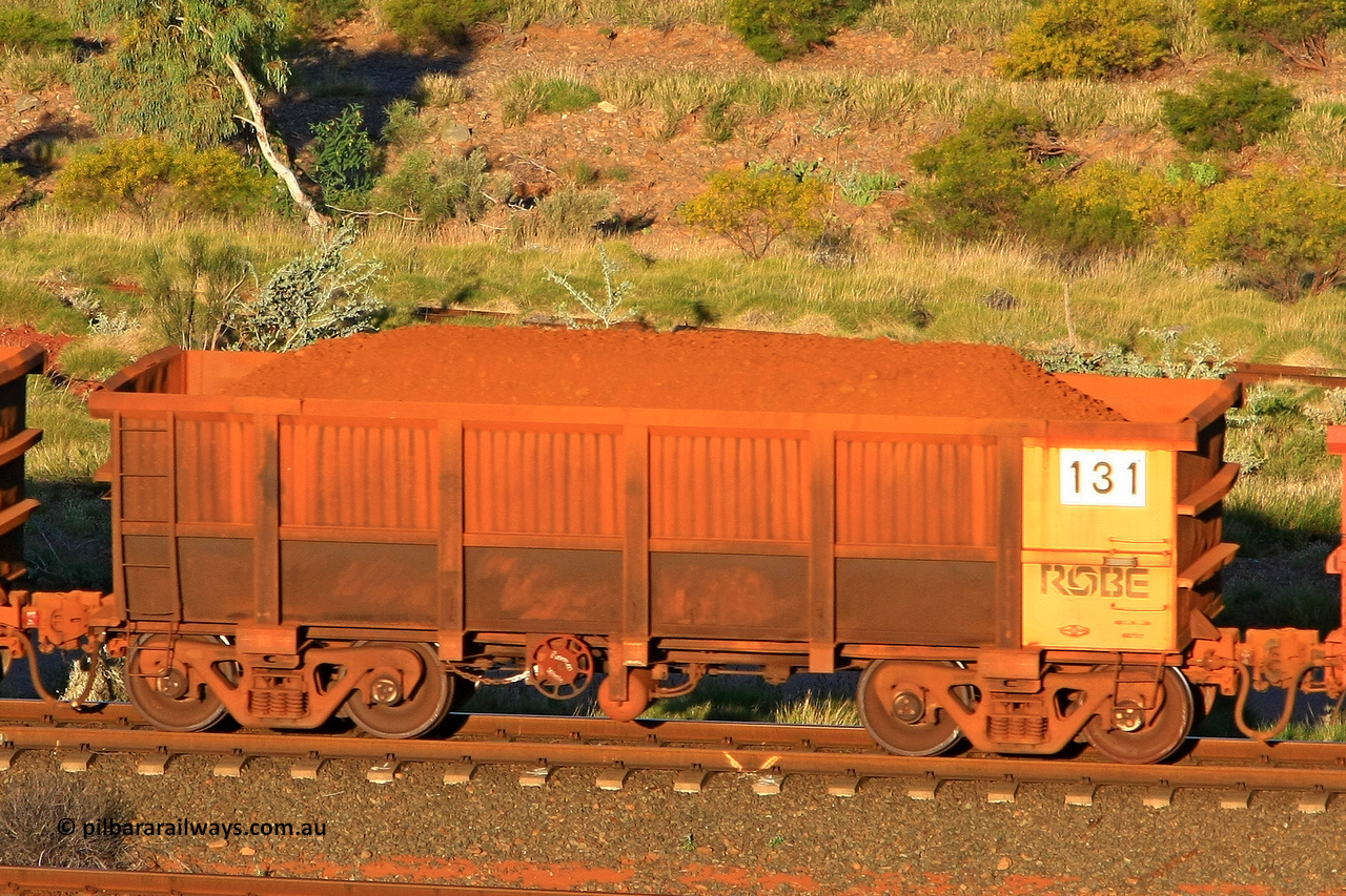 0131 110602 1661
Robe River ore waggon 131, built by Nippon Sharyo Nihon, rotary coupler end handbrake side loaded view at the 71 km, Western Creek on the Deepdale line. June 2, 2011.
Keywords: 131;Nippon-Sharyo-Nihon;Robe-ore-waggon;
