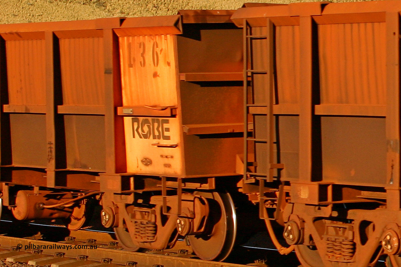 0136 060722 7623
Robe River ore waggon 136, built by Nippon Sharyo Nihon, rotary coupler end and plate view, empty, at the 11.7 km, Cape Lambert. July 22, 2006.
Keywords: 136;Nippon-Sharyo-Nihon;Robe-ore-waggon;