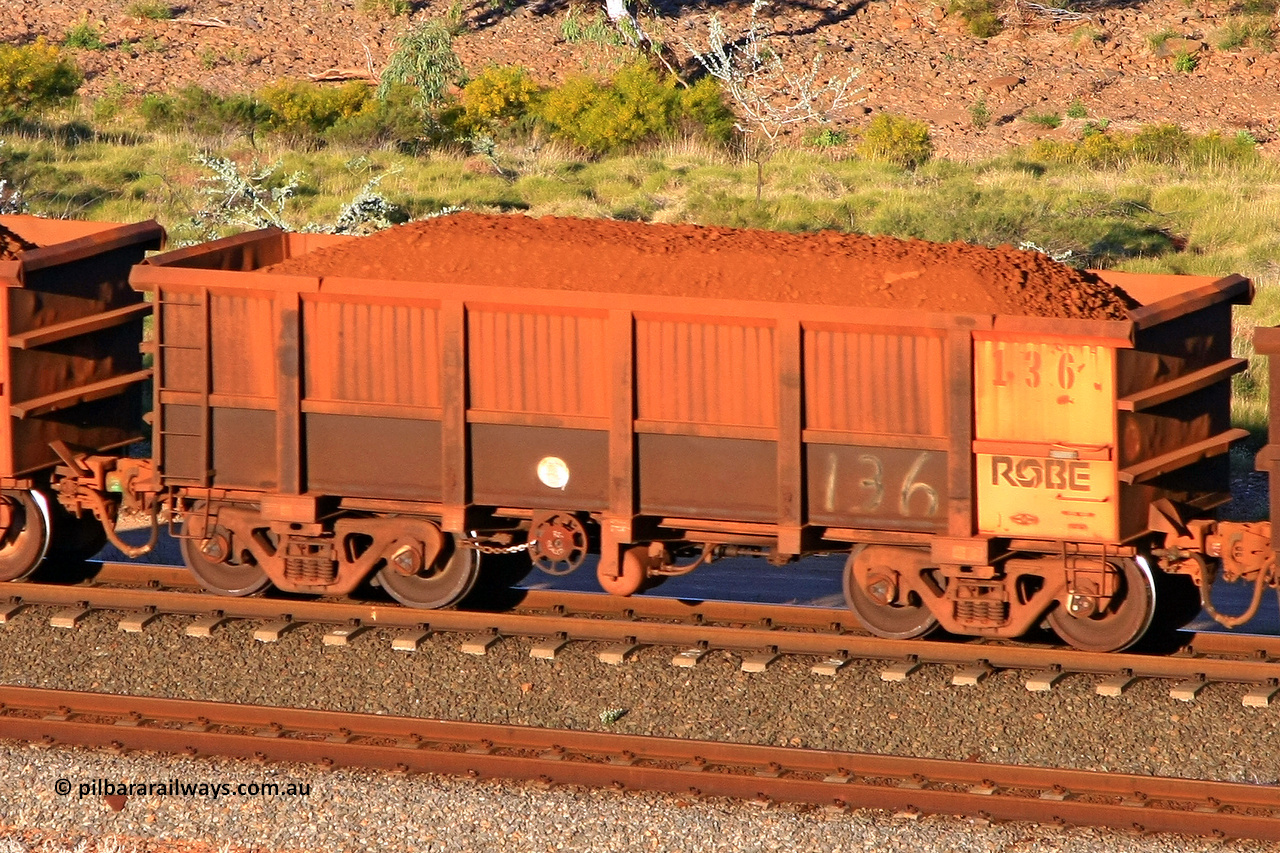 0136 110602 1701
Robe River ore waggon 136, built by Nippon Sharyo Nihon, rotary coupler end handbrake side loaded view at the 71 km, Western Creek on the Deepdale line. June 2, 2011.
Keywords: 136;Nippon-Sharyo-Nihon;Robe-ore-waggon;