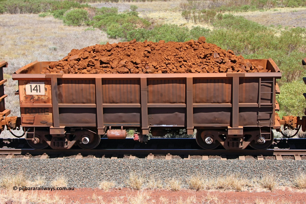 0141 081209 0138
Robe River ore waggon 141, built by Nippon Sharyo Nihon, non-handbrake side loaded view at the 7 km location just south of Cape Lambert yard. December 9, 2008.
Keywords: 141;Nippon-Sharyo-Nihon;Robe-ore-waggon;