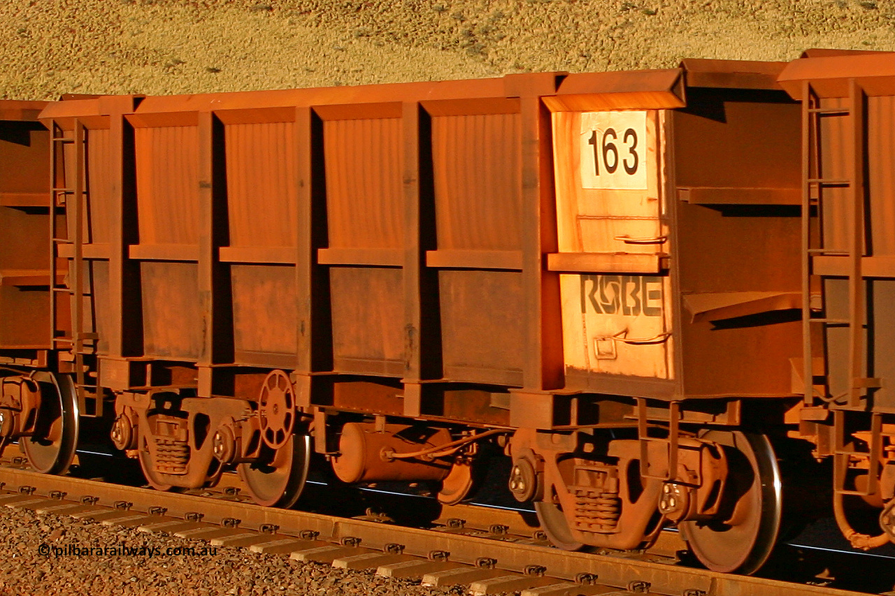 0163 060722 7606
Robe River ore waggon 163, built by Nippon Sharyo Nihon, rotary coupler end handbrake side empty view, panel repair with Centurion Industries waybill holder, at the 11.7 km, Cape Lambert. July 22, 2006.
Keywords: 163;Nippon-Sharyo-Nihon;Robe-ore-waggon;