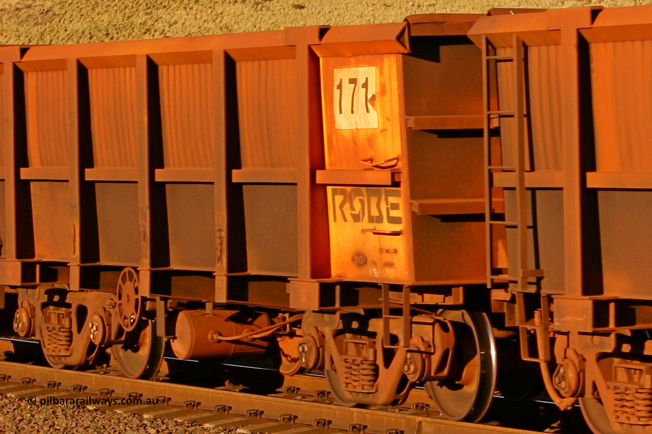 0171 060722 7595
Robe River ore waggon 171, built by Nippon Sharyo Nihon, rotary coupler end handbrake side empty, partial view, at the 11.7 km, Cape Lambert. July 22, 2006.
Keywords: 171;Nippon-Sharyo-Nihon;Robe-ore-waggon;