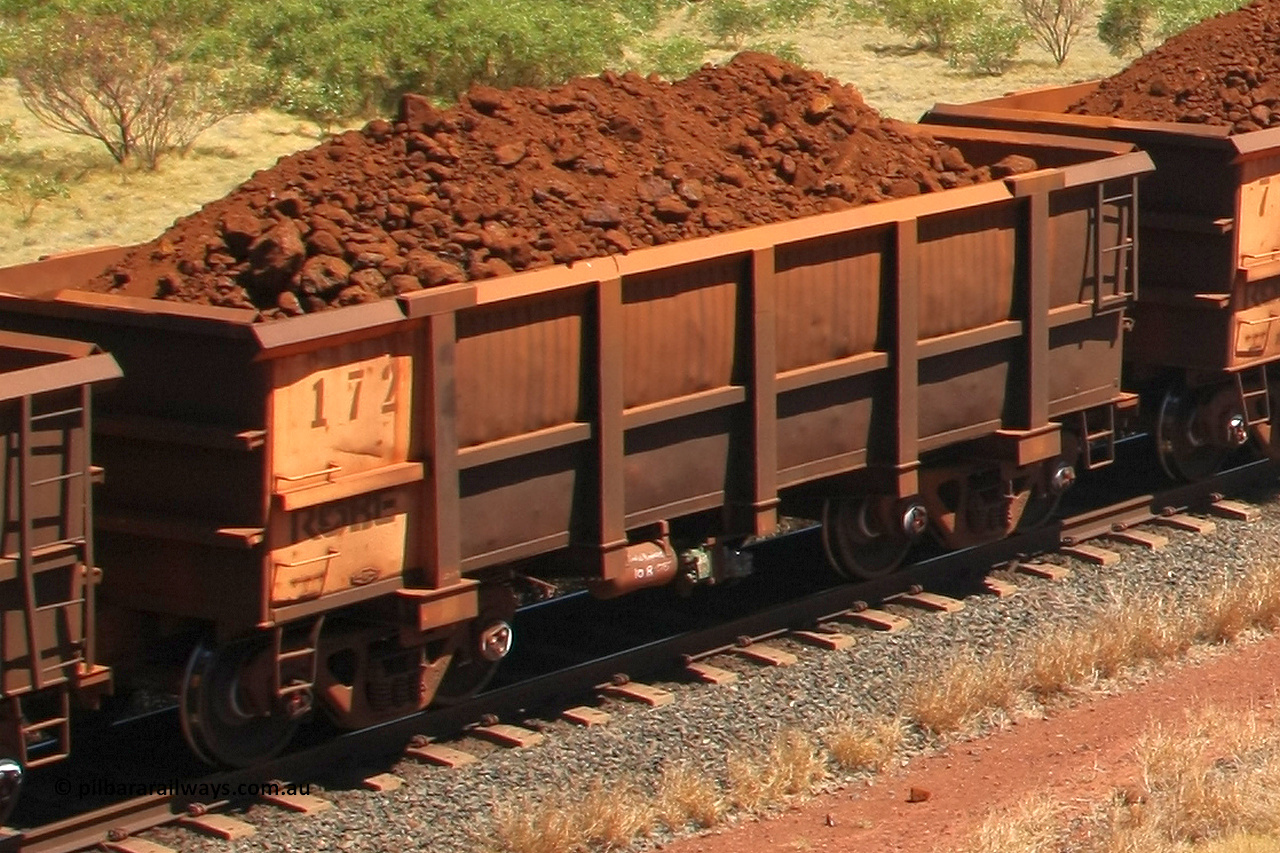 0172 081209 0109
Robe River ore waggon 172, built by Nippon Sharyo Nihon, rotary coupler end non-handbrake side loaded view at the 7 km location just south of Cape Lambert yard. December 9, 2008.
Keywords: 172;Nippon-Sharyo-Nihon;Robe-ore-waggon;