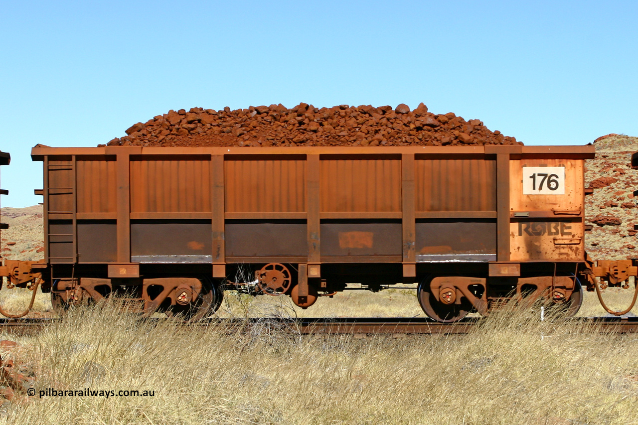 0176 060722 7517
Robe River ore waggon 176, built by Nippon Sharyo Nihon, handbrake side loaded view at the 78.8 km between Western Creek and Maitland on the Deepdale line. July 22, 2006.
Keywords: 176;Nippon-Sharyo-Nihon;Robe-ore-waggon;
