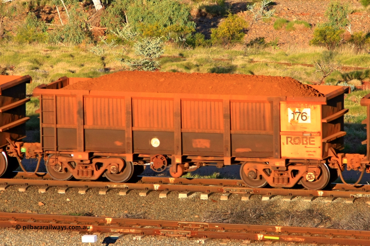 0176 110602 1653
Robe River ore waggon 176, built by Nippon Sharyo Nihon, rotary coupler end handbrake side loaded view at the 71 km, Western Creek on the Deepdale line. June 2, 2011.
Keywords: 176;Nippon-Sharyo-Nihon;Robe-ore-waggon;