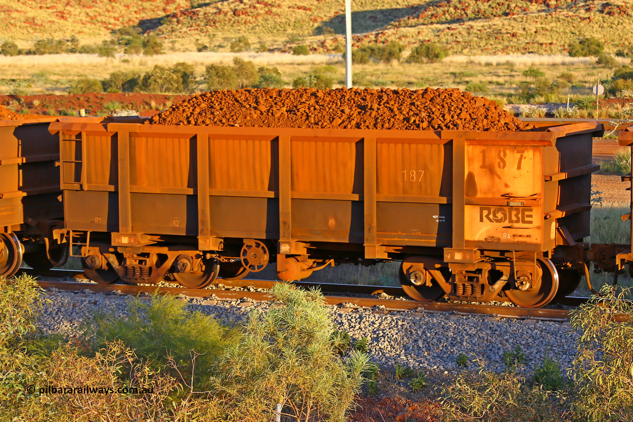 0187 170513 8635
Robe River ore waggon 187, built by Nippon Sharyo Nihon, rotary coupler end handbrake side loaded view, Cape Lambert yard, May 13, 2017.
Keywords: 187;Nippon-Sharyo-Nihon;Robe-ore-waggon;