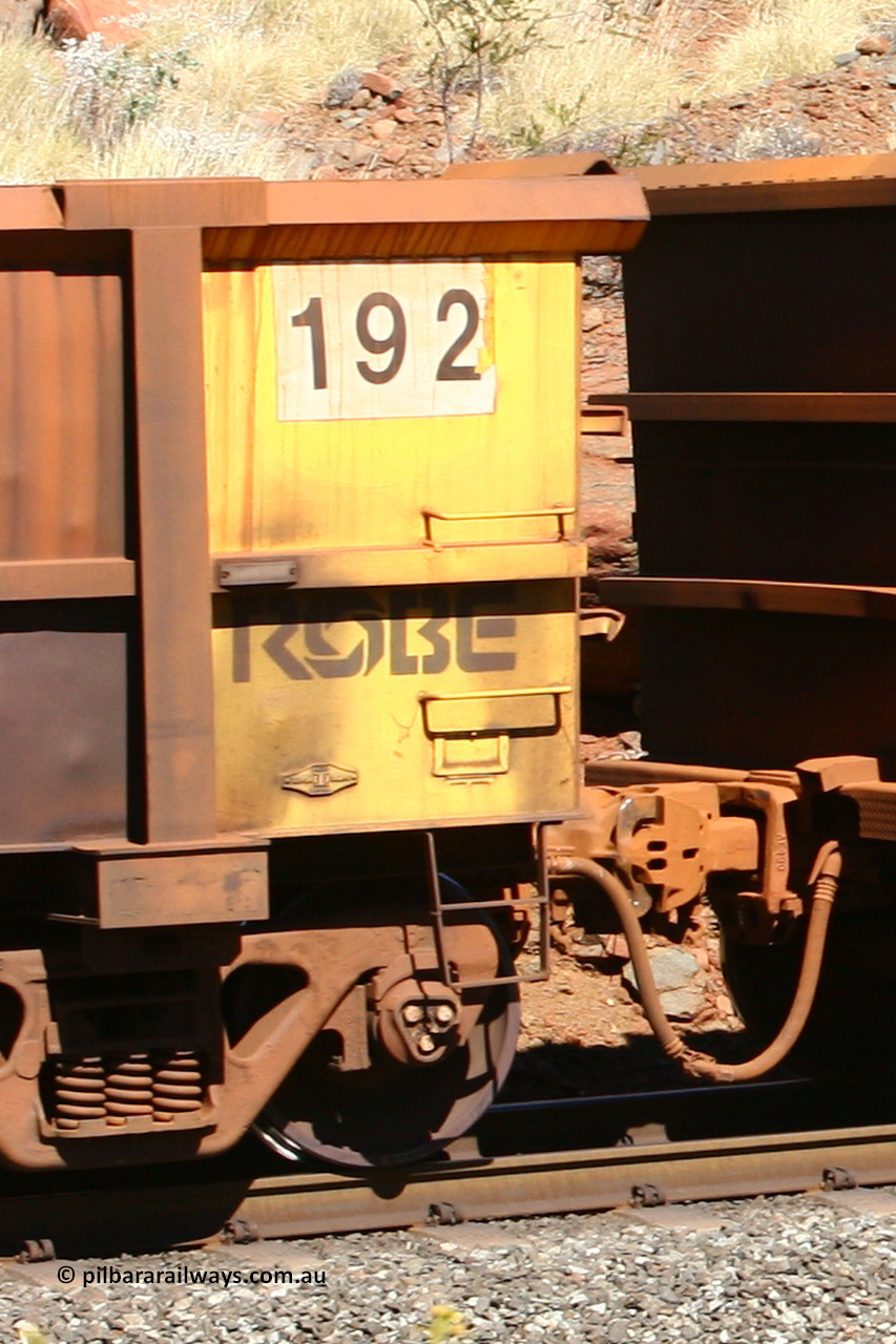 0192 060724 7915
Robe River ore waggon 192, built by Nippon Sharyo Nihon, rotary coupler end plate view at the 74 km, Western Creek on the Deepdale line. July 24, 2006.
Keywords: 192;Nippon-Sharyo-Nihon;Robe-ore-waggon;