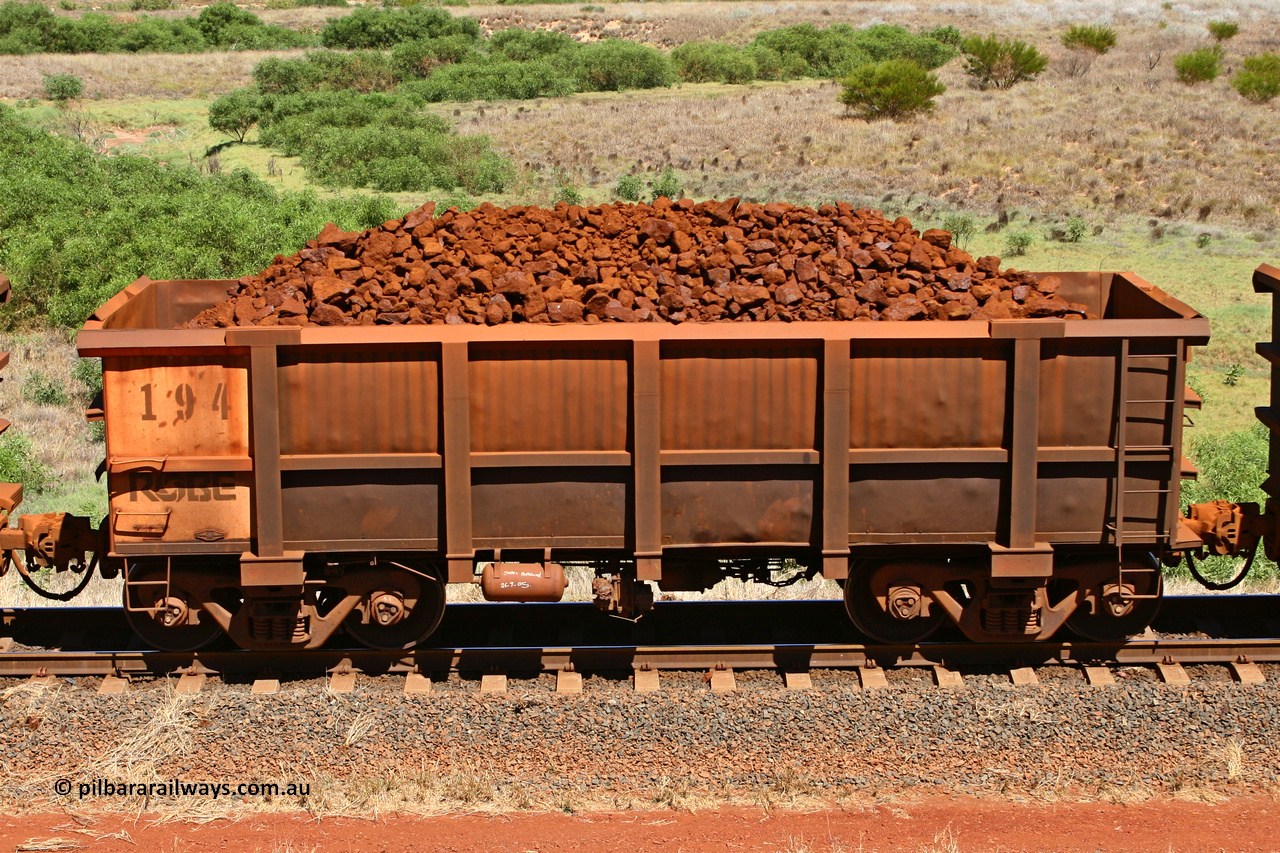 0194 061209 8182
Robe River ore waggon 194, built by Nippon Sharyo Nihon, non-handbrake side loaded view at the 7 km location just south of Cape Lambert yard. December 9, 2006.
Keywords: 194;Nippon-Sharyo-Nihon;Robe-ore-waggon;