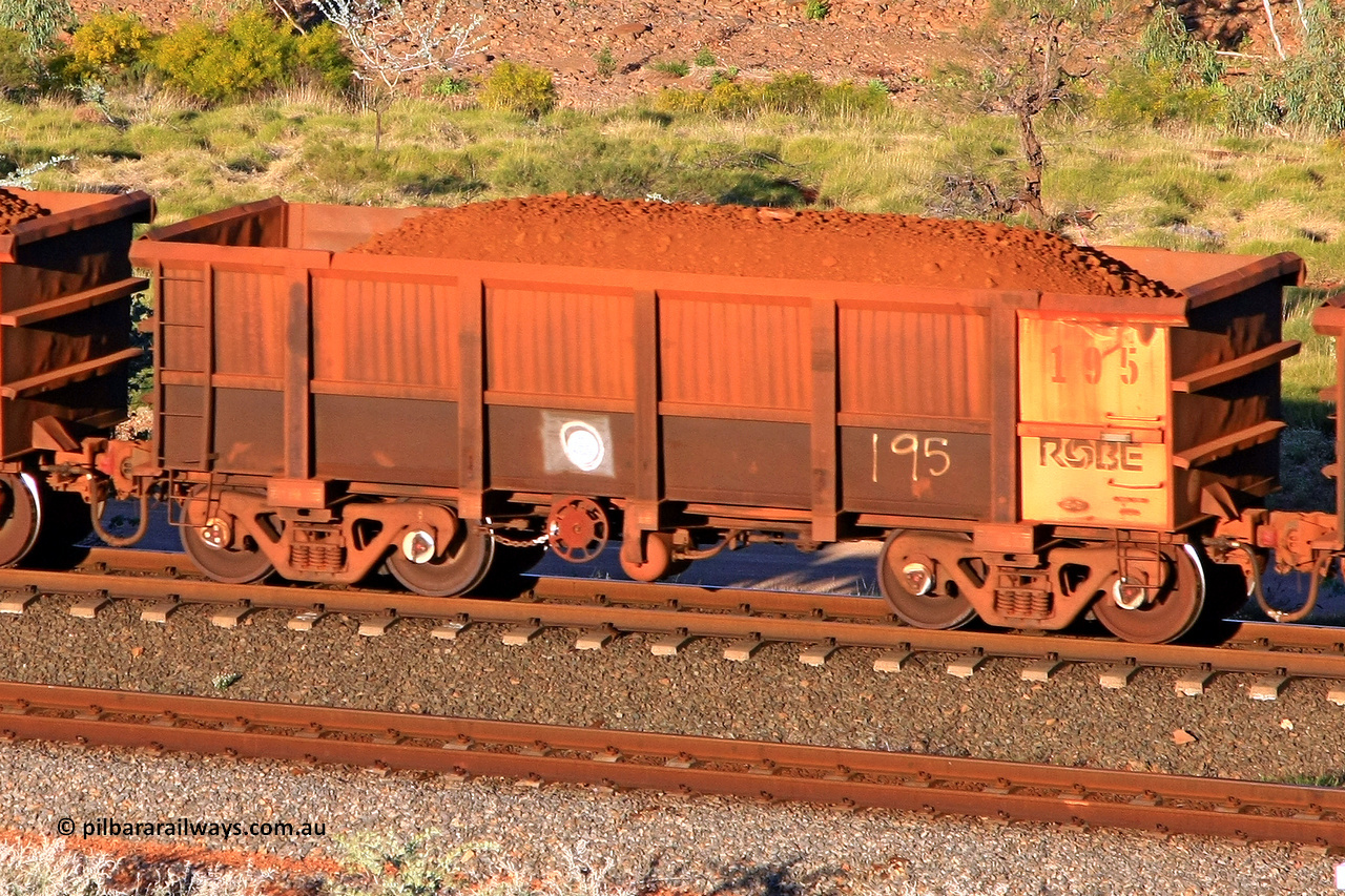 0195 110602 1734
Robe River ore waggon 195, built by Nippon Sharyo Nihon, rotary coupler end handbrake side loaded view at the 71 km, Western Creek on the Deepdale line. June 2, 2011.
Keywords: 195;Nippon-Sharyo-Nihon;Robe-ore-waggon;