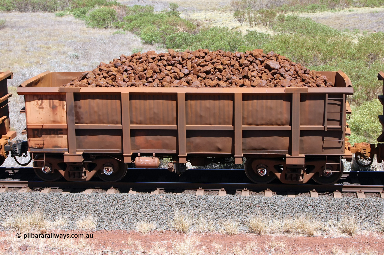 0204 081209 0113
Robe River ore waggon 190, built by Nippon Sharyo Nihon, non-handbrake side loaded view at the 7 km location just south of Cape Lambert yard. December 9, 2008.
Keywords: 204;Nippon-Sharyo-Nihon;Robe-ore-waggon;