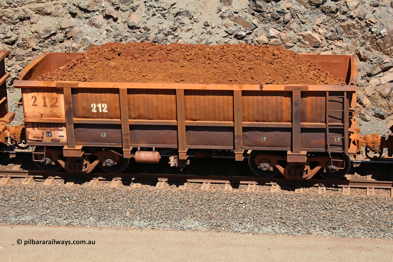 0212 160306 1529
Robe River ore waggon 212, built by Nippon Sharyo Nihon, fixed coupler non-handbrake side loaded view at the 45 km, Harding Siding on the Cape Lambert line. March 6, 2016.
Keywords: 212;Nippon-Sharyo-Nihon;Robe-ore-waggon;