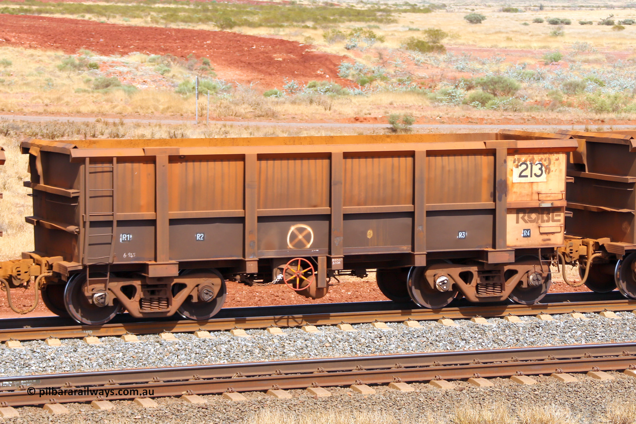 0213 141124 6803
Robe River ore waggon 213, built by Nippon Sharyo Nihon, fixed coupler handbrake side empty view at the 25 km at Arches Siding on the Cape Lambert line. November 24, 2014.
Keywords: 213;Nippon-Sharyo-Nihon;Robe-ore-waggon;