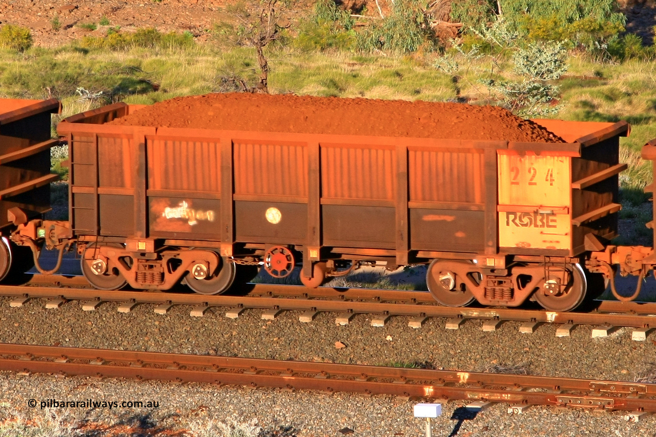 0224 110602 1641
Robe River ore waggon 224, built by Nippon Sharyo Nihon, rotary coupler end handbrake side loaded view at the 71 km, Western Creek on the Deepdale line. June 2, 2011.
Keywords: 224;Nippon-Sharyo-Nihon;Robe-ore-waggon;