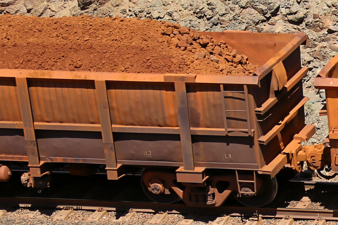 0229 160306 1592
Robe River ore waggon 229, built by Nippon Sharyo Nihon, fixed coupler non-handbrake side loaded view at the 45 km, Harding Siding on the Cape Lambert line. March 6, 2016.
Keywords: 229;Nippon-Sharyo-Nihon;Robe-ore-waggon;