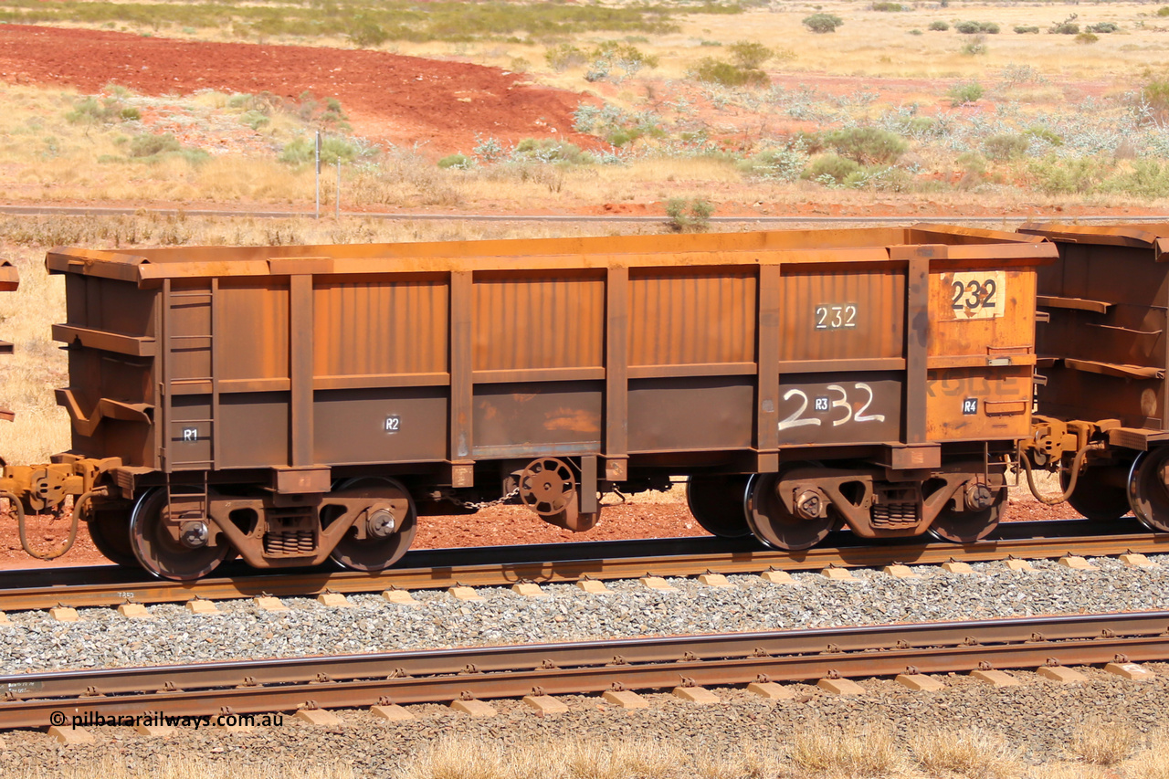 0232 141124 6836
Robe River ore waggon 232, built by Nippon Sharyo Nihon, fixed coupler handbrake side empty view at the 25 km at Arches Siding on the Cape Lambert line. November 24, 2014.
Keywords: 232;Nippon-Sharyo-Nihon;Robe-ore-waggon;