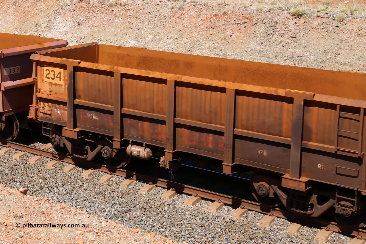 0234 160306 1321
Robe River ore waggon 234, built by Nippon Sharyo Nihon, fixed coupler non-handbrake side empty, partial view at Greenpool on the Cape Lambert line. March 6, 2016.
Keywords: 234;Nippon-Sharyo-Nihon;Robe-ore-waggon;