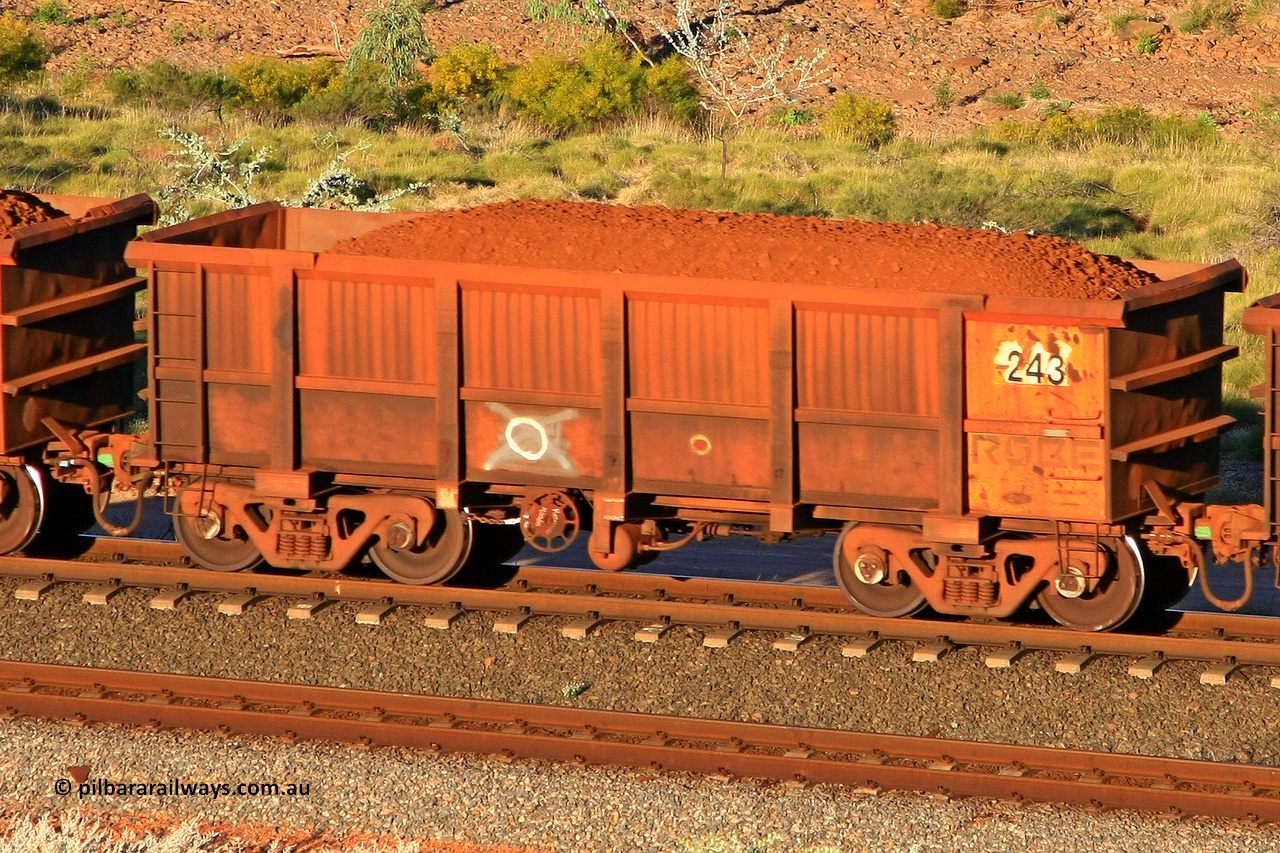 0243 110602 1724
Robe River ore waggon 243, built by Nippon Sharyo Nihon, rotary coupler end handbrake side loaded view at the 71 km, Western Creek on the Deepdale line. June 2, 2011.
Keywords: 243;Nippon-Sharyo-Nihon;Robe-ore-waggon;