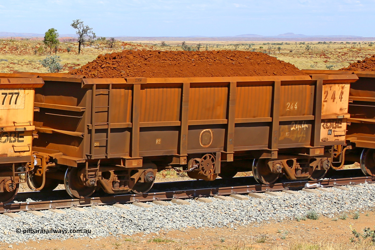 0244 170729 0244
Robe River ore waggon 244, built by Nippon Sharyo Nihon, fixed coupler handbrake side loaded view at the 103 km, between Maitland Siding and the Fortescue River on the Deepdale line. July 29, 2017.
Keywords: 244;Nippon-Sharyo-Nihon;Robe-ore-waggon;