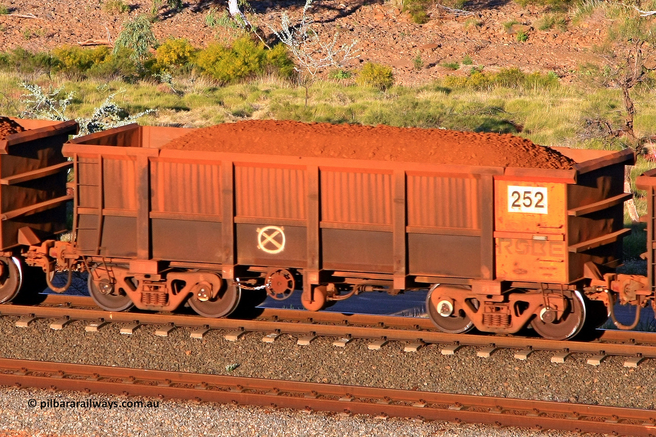 0252 110602 1713
Robe River ore waggon 252, built by Nippon Sharyo Nihon, rotary coupler end handbrake side loaded view at the 71 km, Western Creek on the Deepdale line. June 2, 2011.
Keywords: 252;Nippon-Sharyo-Nihon;Robe-ore-waggon;