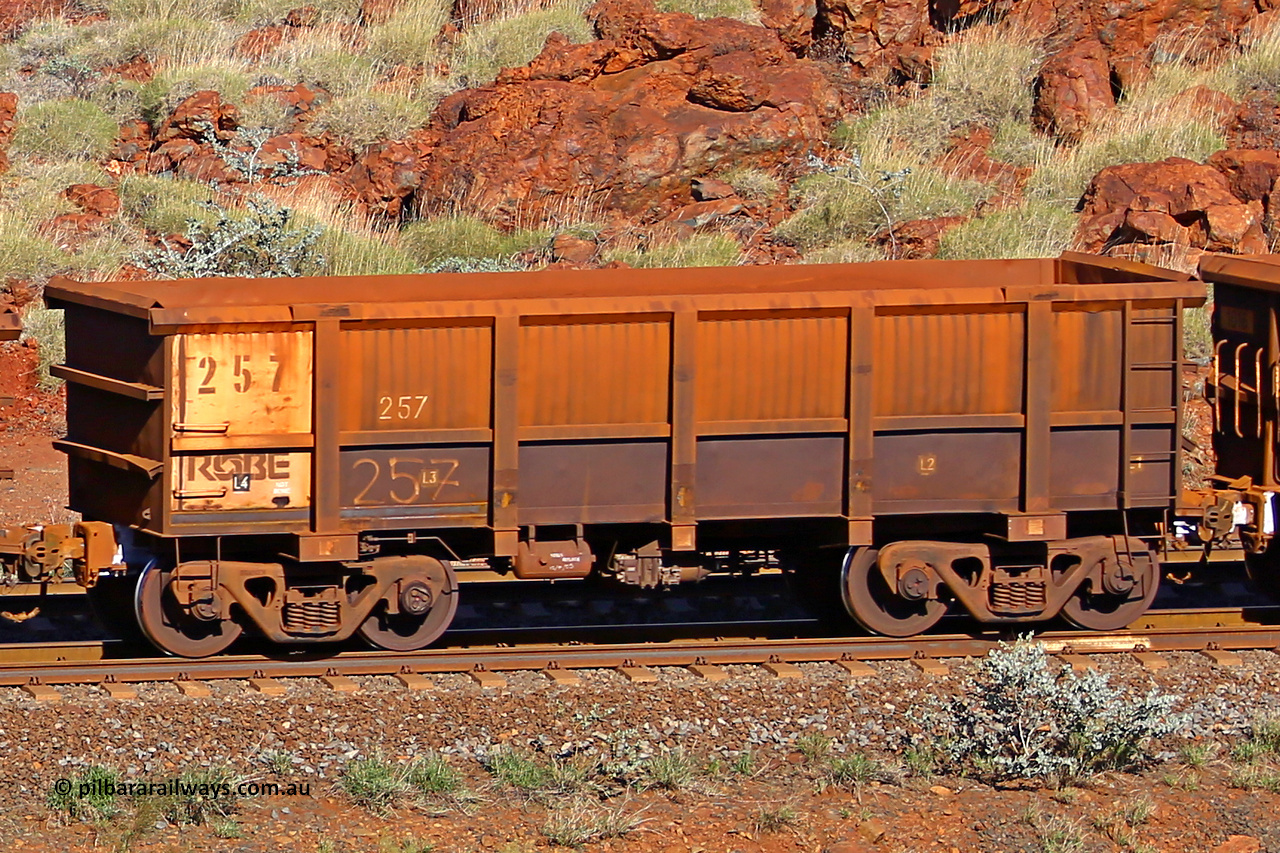 0257 180616 1696
Robe River ore waggon 257, built by Nippon Sharyo Nihon, rotary coupler end non-handbrake side empty view at the 38 km, Harding on the Cape Lambert line, June 16, 2018.
Keywords: 257;Nippon-Sharyo-Nihon;Robe-ore-waggon;