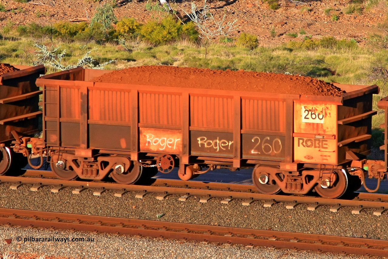 0260 110602 1725
Robe River ore waggon 260, built by Nippon Sharyo Nihon, rotary coupler end handbrake side loaded view at the 71 km, Western Creek on the Deepdale line. June 2, 2011.
Keywords: 260;Nippon-Sharyo-Nihon;Robe-ore-waggon;