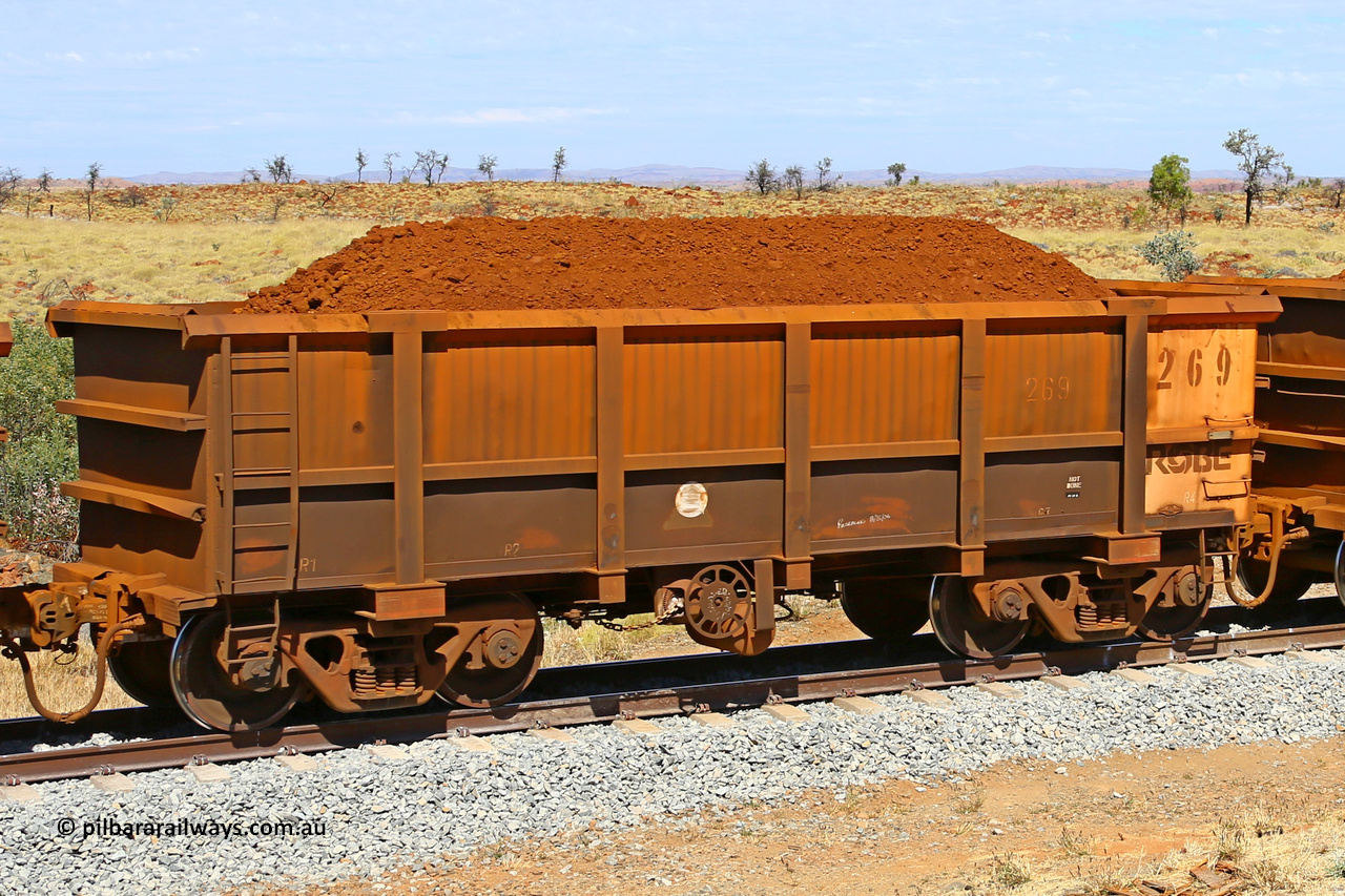 0269 170729 0221
Robe River ore waggon 269, built by Nippon Sharyo Nihon, fixed coupler handbrake side loaded view at the 103 km, between Maitland Siding and the Fortescue River on the Deepdale line. July 29, 2017.
Keywords: 269;Nippon-Sharyo-Nihon;Robe-ore-waggon;