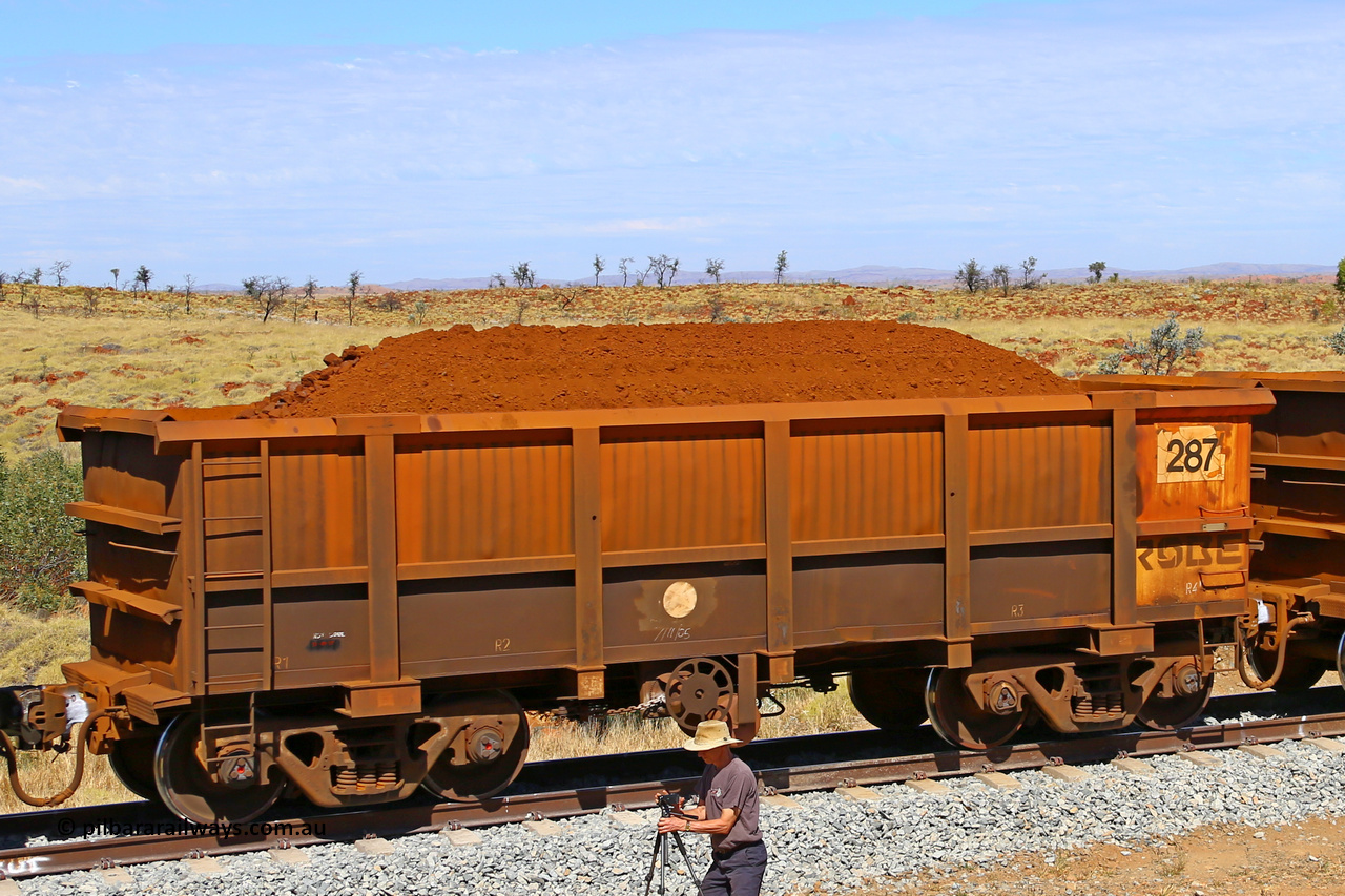 0287 170729 0276
Robe River ore waggon 287, built by Nippon Sharyo Nihon, fixed coupler handbrake side loaded view at the 103 km, between Maitland Siding and the Fortescue River on the Deepdale line. July 29, 2017.
Keywords: 287;Nippon-Sharyo-Nihon;Robe-ore-waggon;