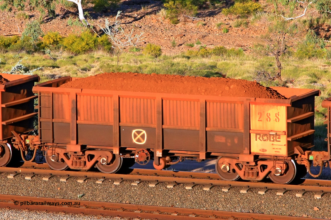 0288 110602 1692
Robe River ore waggon 288, built by Nippon Sharyo Nihon, rotary coupler end handbrake side loaded view at the 71 km, Western Creek on the Deepdale line. June 2, 2011.
Keywords: 288;Nippon-Sharyo-Nihon;Robe-ore-waggon;