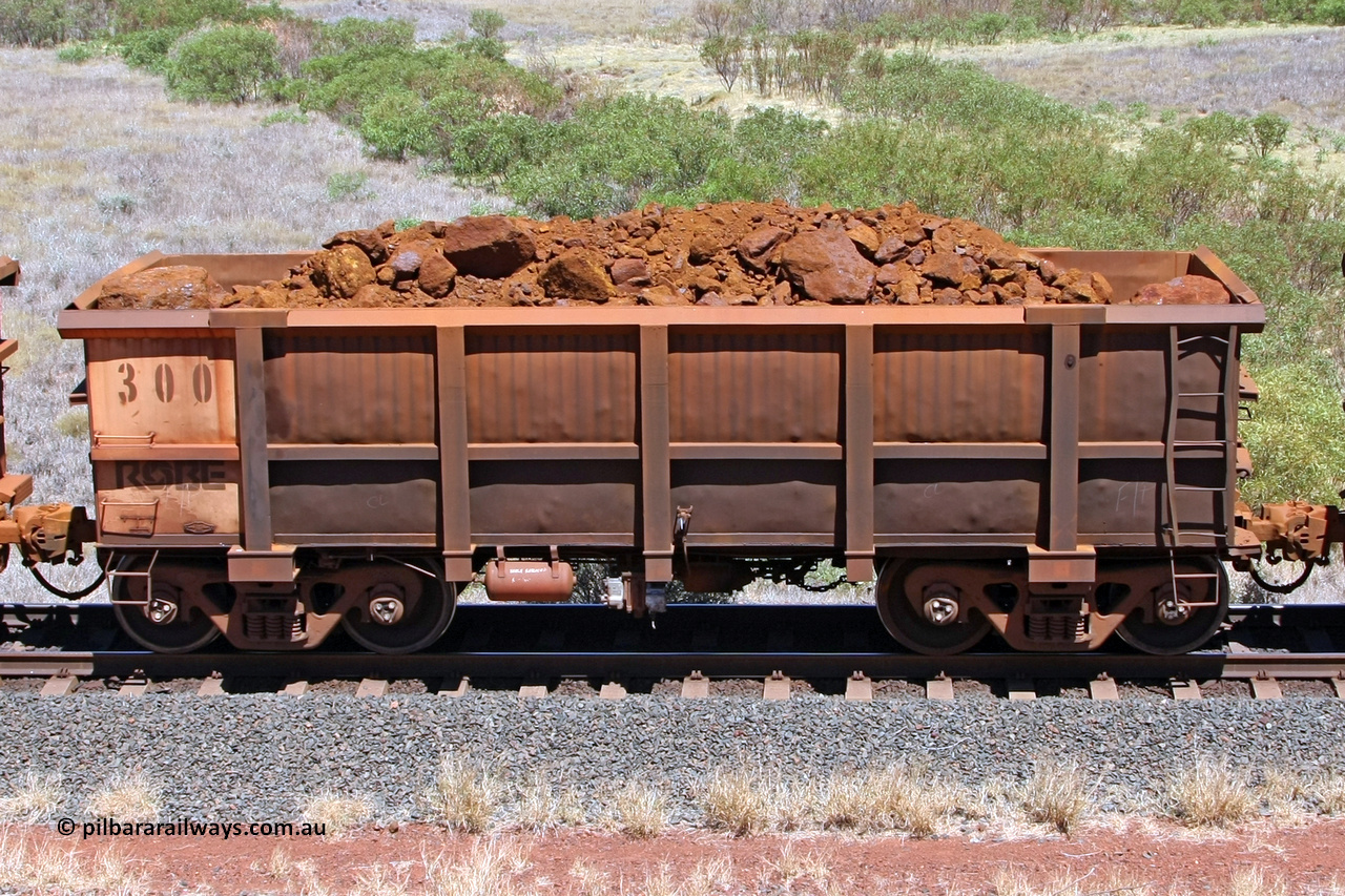 0300 081209 0149
Robe River ore waggon 300, built by Nippon Sharyo Nihon, non-handbrake side loaded view at the 7 km location just south of Cape Lambert yard. December 9, 2008.
Keywords: 300;Nippon-Sharyo-Nihon;Robe-ore-waggon;
