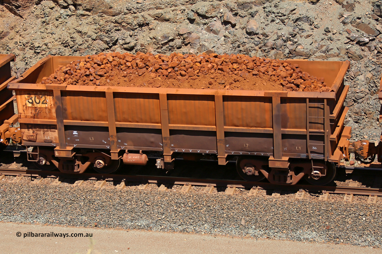 0302 160306 1668
Robe River ore waggon 302, built by Nippon Sharyo Nihon, fixed coupler non-handbrake side loaded view at the 45 km, Harding Siding on the Cape Lambert line. March 6, 2016.
Keywords: 302;Nippon-Sharyo-Nihon;Robe-ore-waggon;