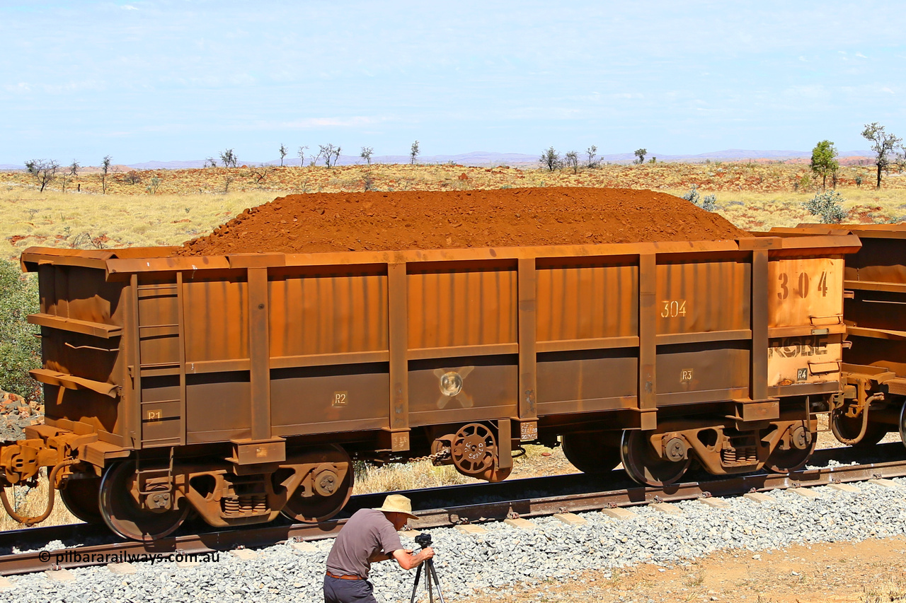 0304 170729 0264
Robe River ore waggon 304, built by Nippon Sharyo Nihon, fixed coupler handbrake side loaded view at the 103 km, between Maitland Siding and the Fortescue River on the Deepdale line. July 29, 2017.
Keywords: 304;Nippon-Sharyo-Nihon;Robe-ore-waggon;