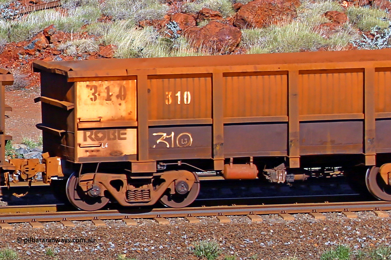 0310 180616 1742
Robe River ore waggon 310, built by Nippon Sharyo Nihon, rotary coupler end non-handbrake side empty view at the 38 km, Harding on the Cape Lambert line, June 16, 2018.
Keywords: 310;Nippon-Sharyo-Nihon;Robe-ore-waggon;
