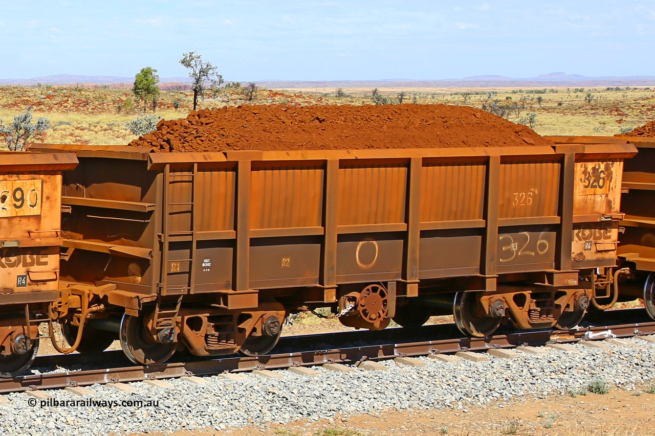 0326 170729 0247
Robe River ore waggon 326, built by Nippon Sharyo Nihon, fixed coupler handbrake side loaded view at the 103 km, between Maitland Siding and the Fortescue River on the Deepdale line. July 29, 2017.
Keywords: 326;Nippon-Sharyo-Nihon;Robe-ore-waggon;