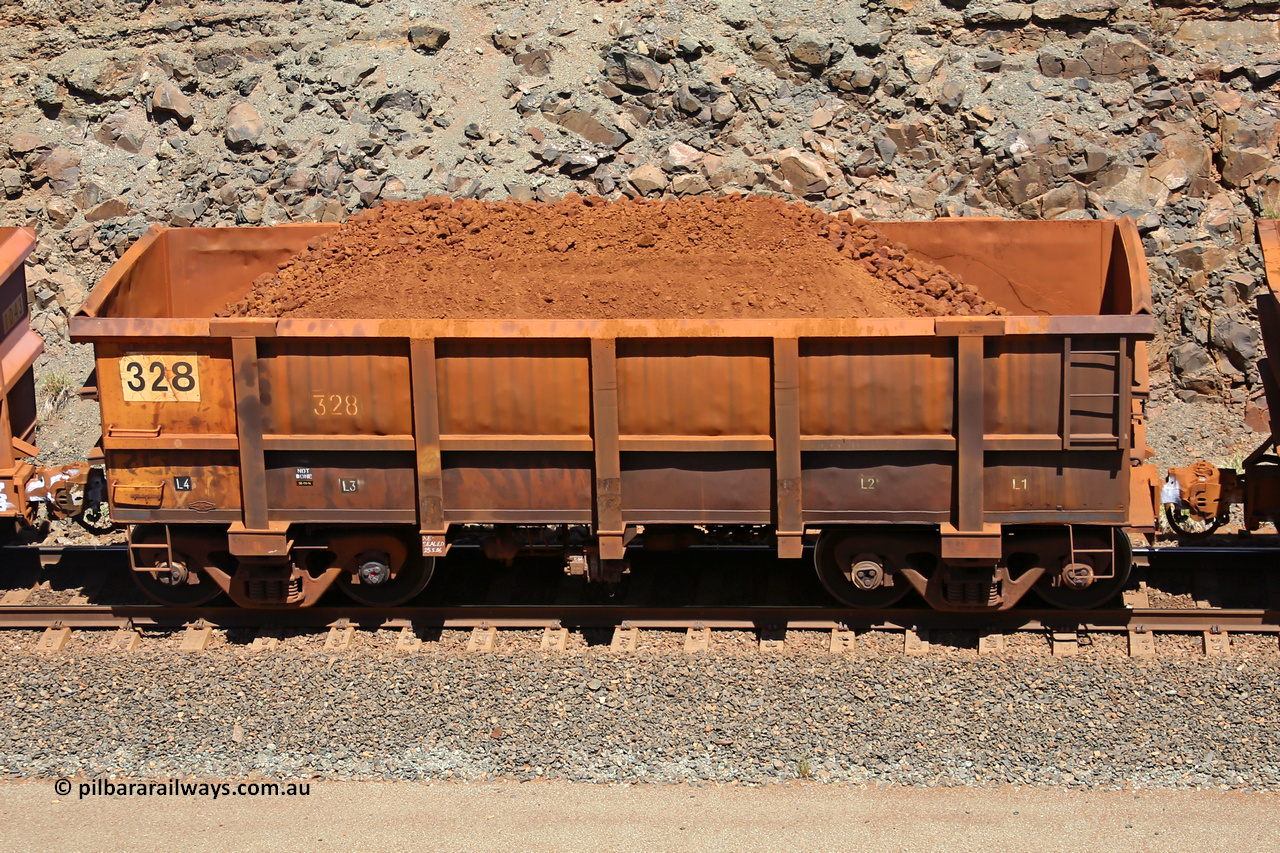 0328 160306 1512
Robe River ore waggon 328, built by Nippon Sharyo Nihon, fixed coupler non-handbrake side loaded view at the 45 km, Harding Siding on the Cape Lambert line. March 6, 2016.
Keywords: 328;Nippon-Sharyo-Nihon;Robe-ore-waggon;