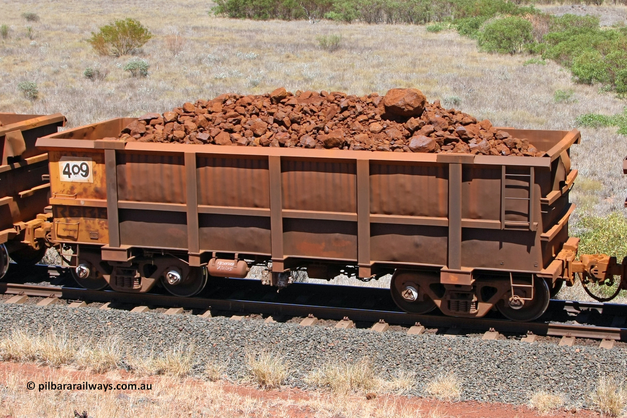 0409 081209 0155
Robe River ore waggon 409, built by Tomlinson Steel WA, fixed coupler non-handbrake side loaded view at the 7 km location just south of Cape Lambert yard. December 9, 2008.
Keywords: 409;Tomlinson-Steel-WA;Robe-ore-waggon;