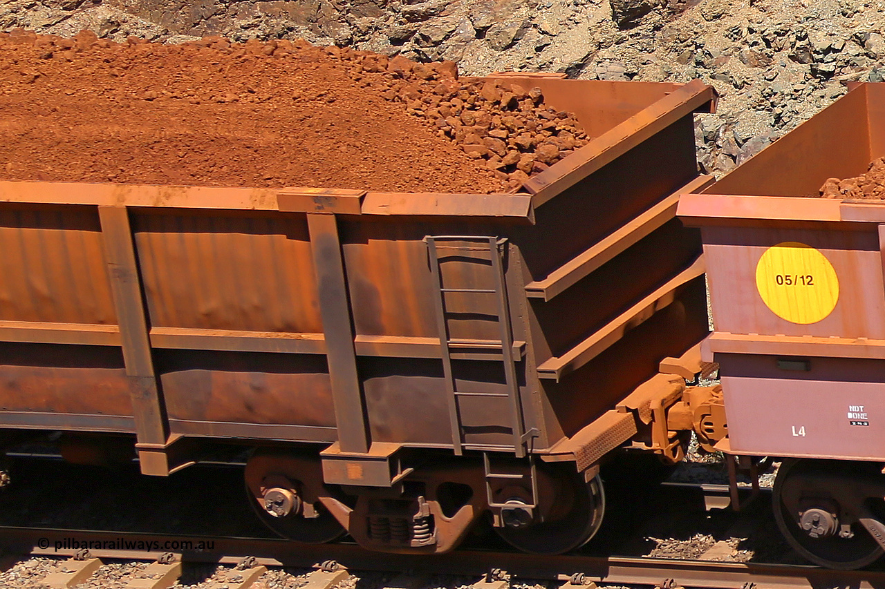 0417 160306 1623
Robe River ore waggon 417, built by Tomlinson Steel WA, fixed coupler non-handbrake side loaded parital view of end, at the 45 km, Harding Siding on the Cape Lambert line. March 6, 2016.
Keywords: 417;Tomlinson-Steel-WA;Robe-ore-waggon;