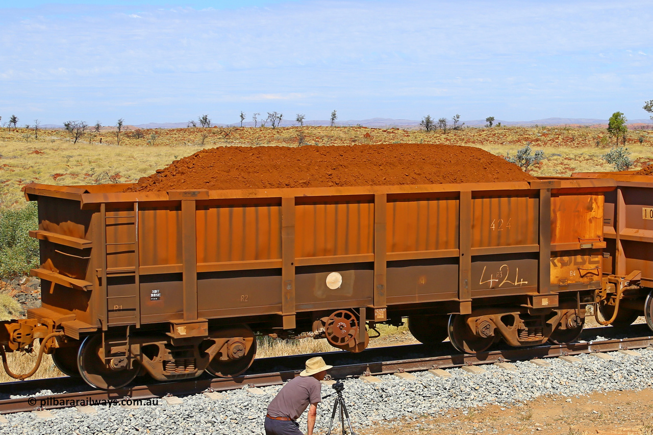 0424 170729 0265
Robe River ore waggon 424, built by Tomlinson Steel WA, fixed coupler handbrake side loaded view at the 103 km, between Maitland Siding and the Fortescue River on the Deepdale line. July 29, 2017.
Keywords: 424;Tomlinson-Steel-WA;Robe-ore-waggon;