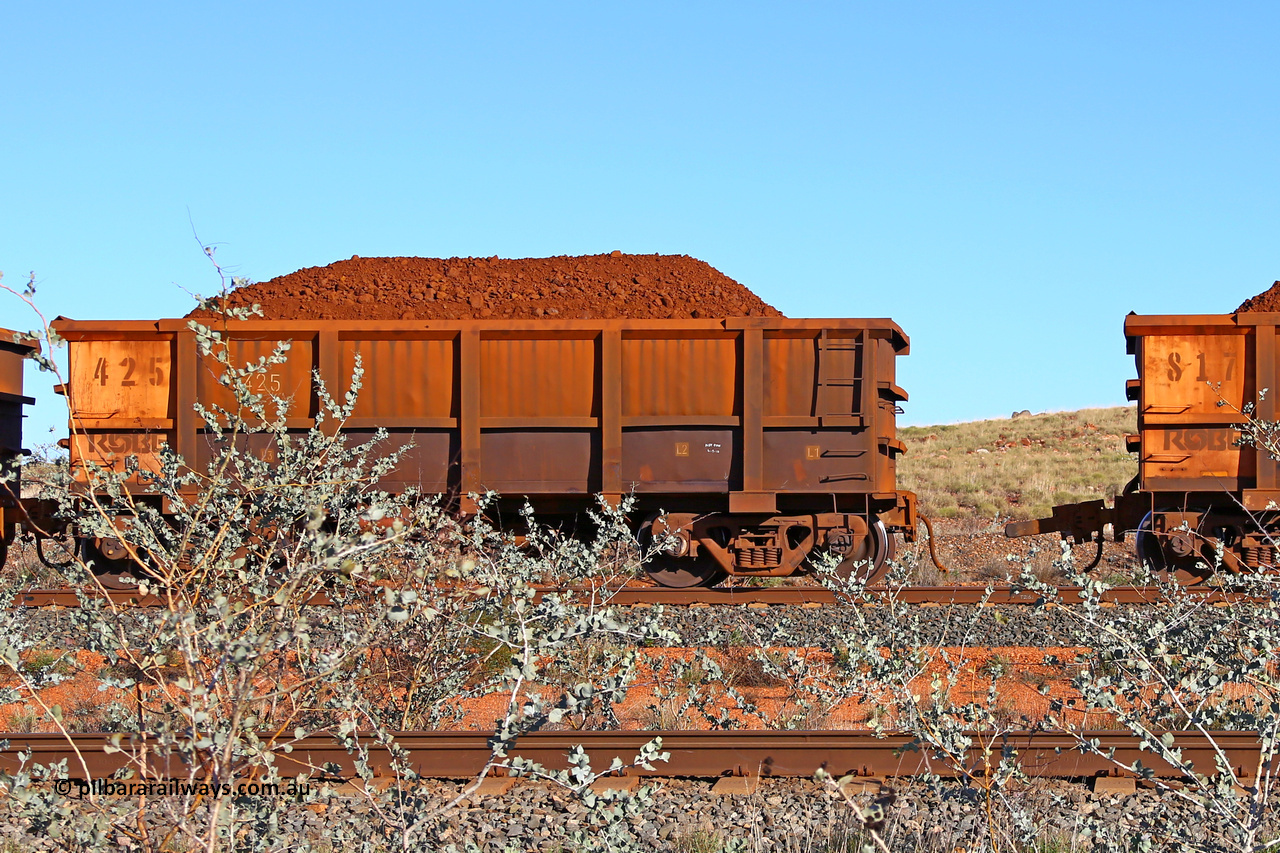 0425 180616 1674
Robe River ore waggon 425, built by Tomlinson Steel WA, fixed coupler non-handbrake side loaded view at the 33.7 km, Arches on the Cape Lambert line, June 16, 2018.
Keywords: 425;Tomlinson-Steel-WA;Robe-ore-waggon;