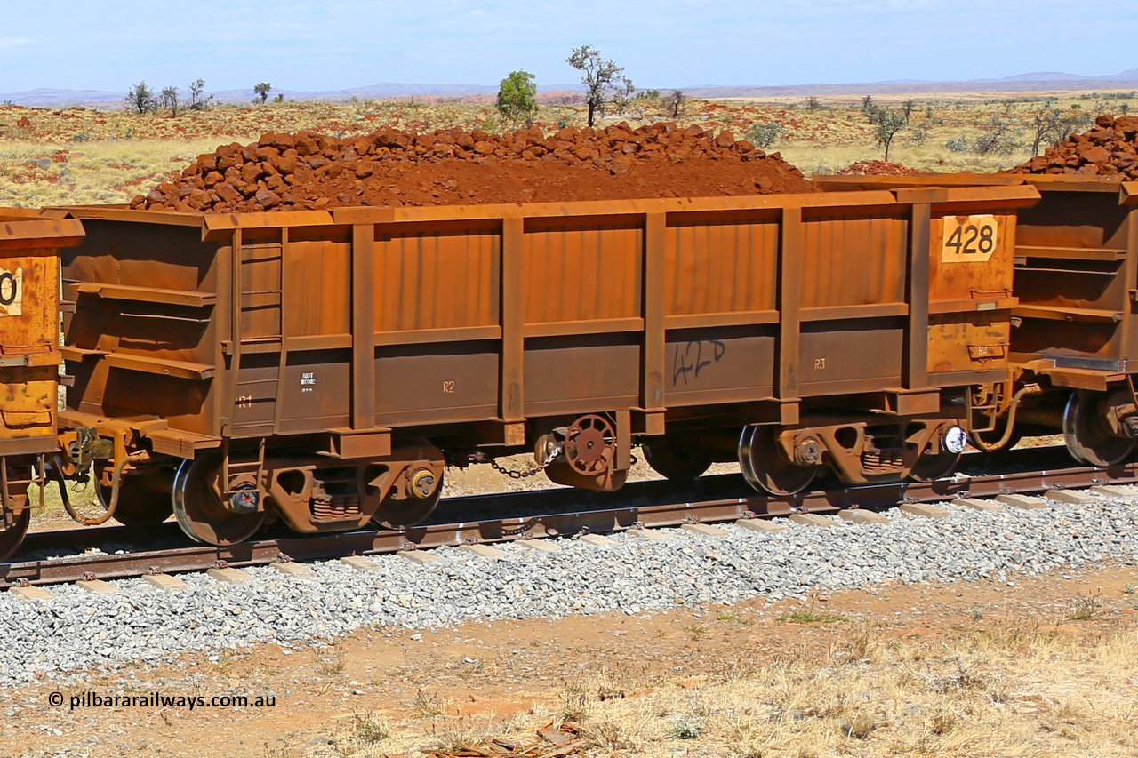 0428 170729 0195
Robe River ore waggon 428, built by Tomlinson Steel WA, fixed coupler handbrake side loaded view at the 103 km, between Maitland Siding and the Fortescue River on the Deepdale line. July 29, 2017.
Keywords: 428;Tomlinson-Steel-WA;Robe-ore-waggon;